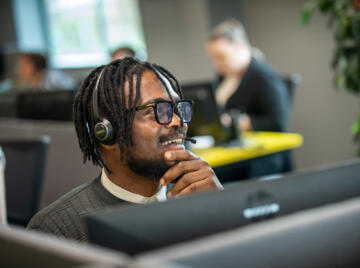 alt=Lemon Contact Centre operator wearing headset"