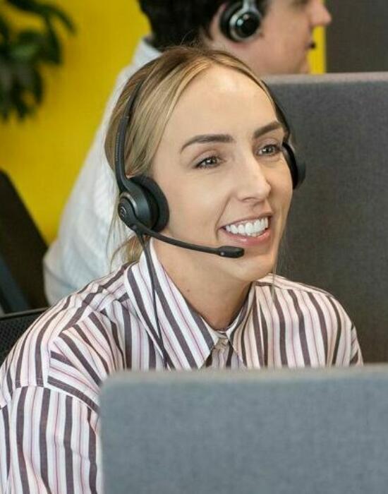 alt="Lemon Contact Centre operator wearing headset"