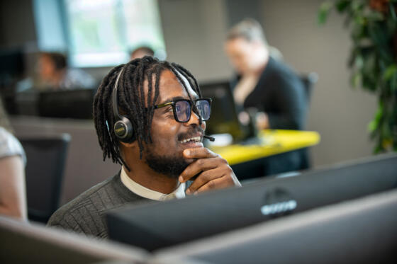 alt="Lemon Contact Centre operator wearing headet"