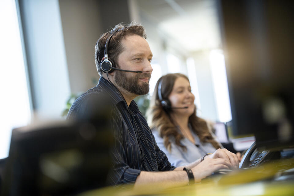 alt="Lemon Contact Centre operators wearing headsets speaking to clients"